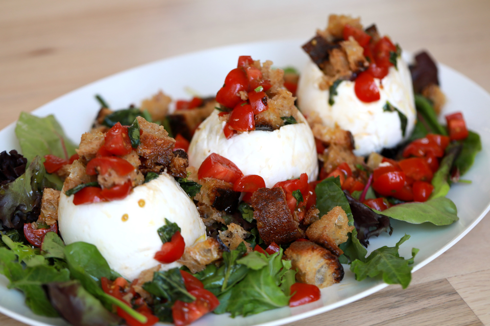 Panzanella Stuffed Mozzarella on a white plate.