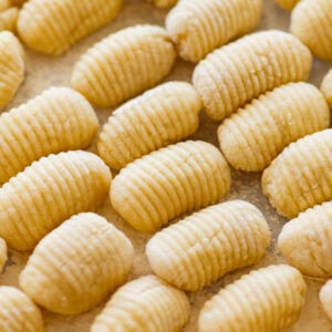 A tray of uncooked gnocchi.
