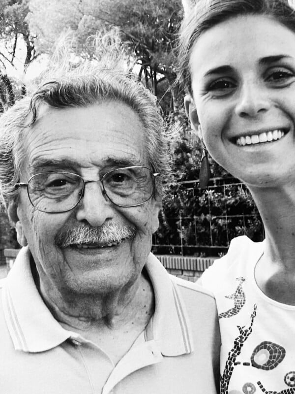 Black and white photo of a smiling man and woman.