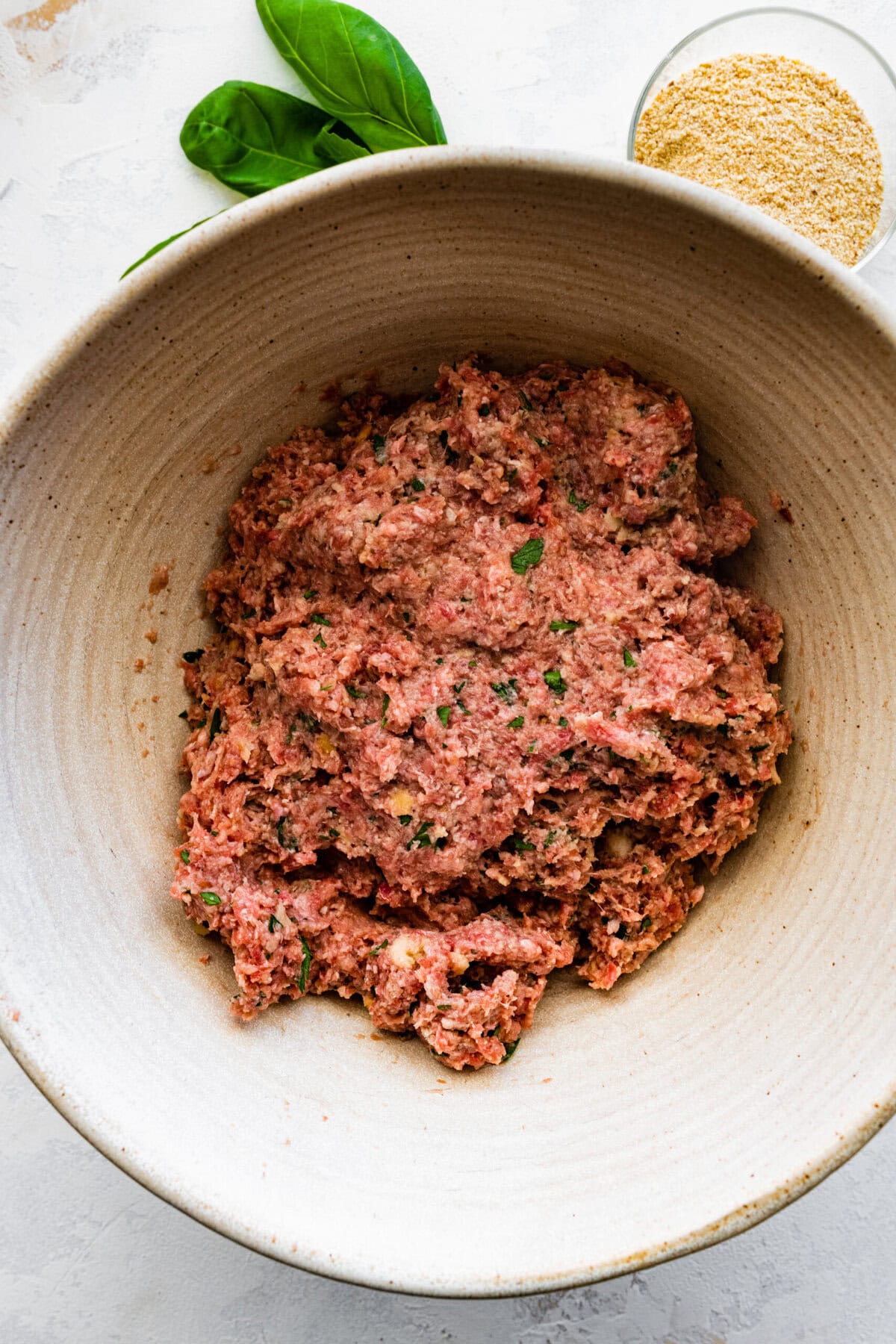 How to make Polpette (Traditional Italian Meatballs) Instructions: mix the meat mixture until combined.