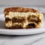 A slice of authentic tiramisu on a plate.