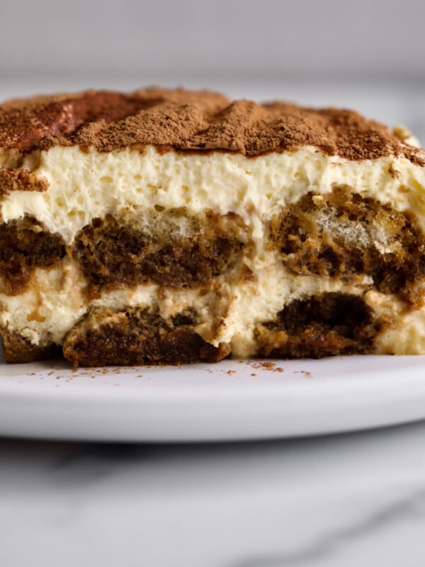 slice of classic tiramisu recipe on a plate