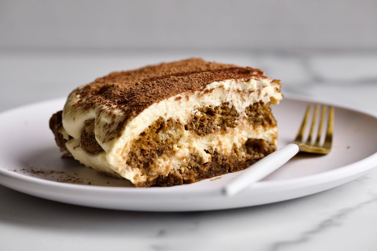 slice of tiramisu on a plate.