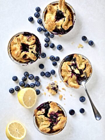 blueberry mini pies on a plate