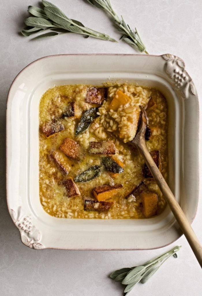 Butternut squash risotto in a square serving bowl