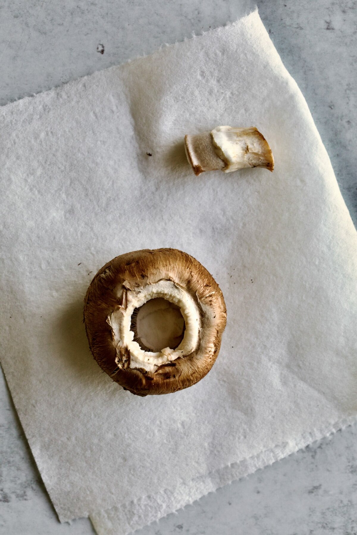 cleaning the portabello mushrooms before baking