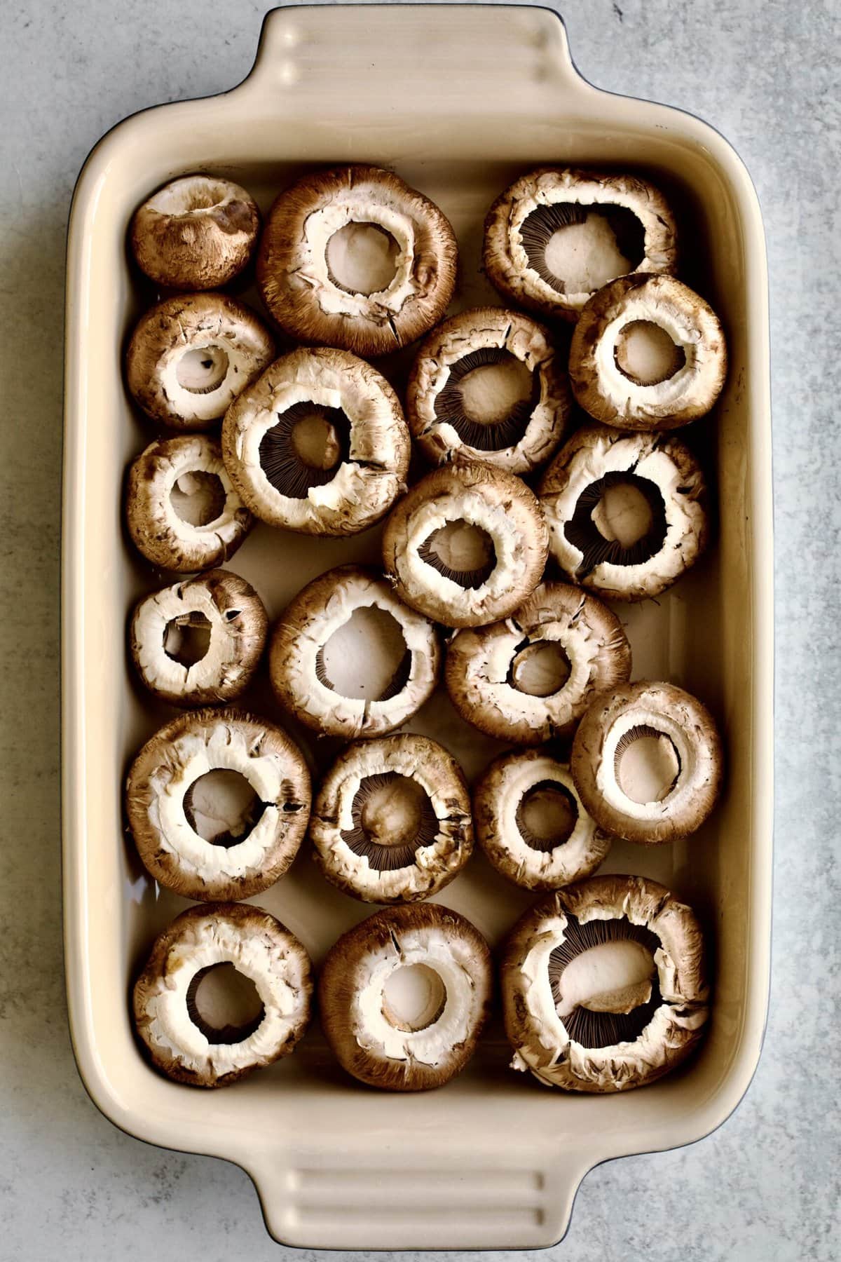 mushrooms in baking dish ready to bake