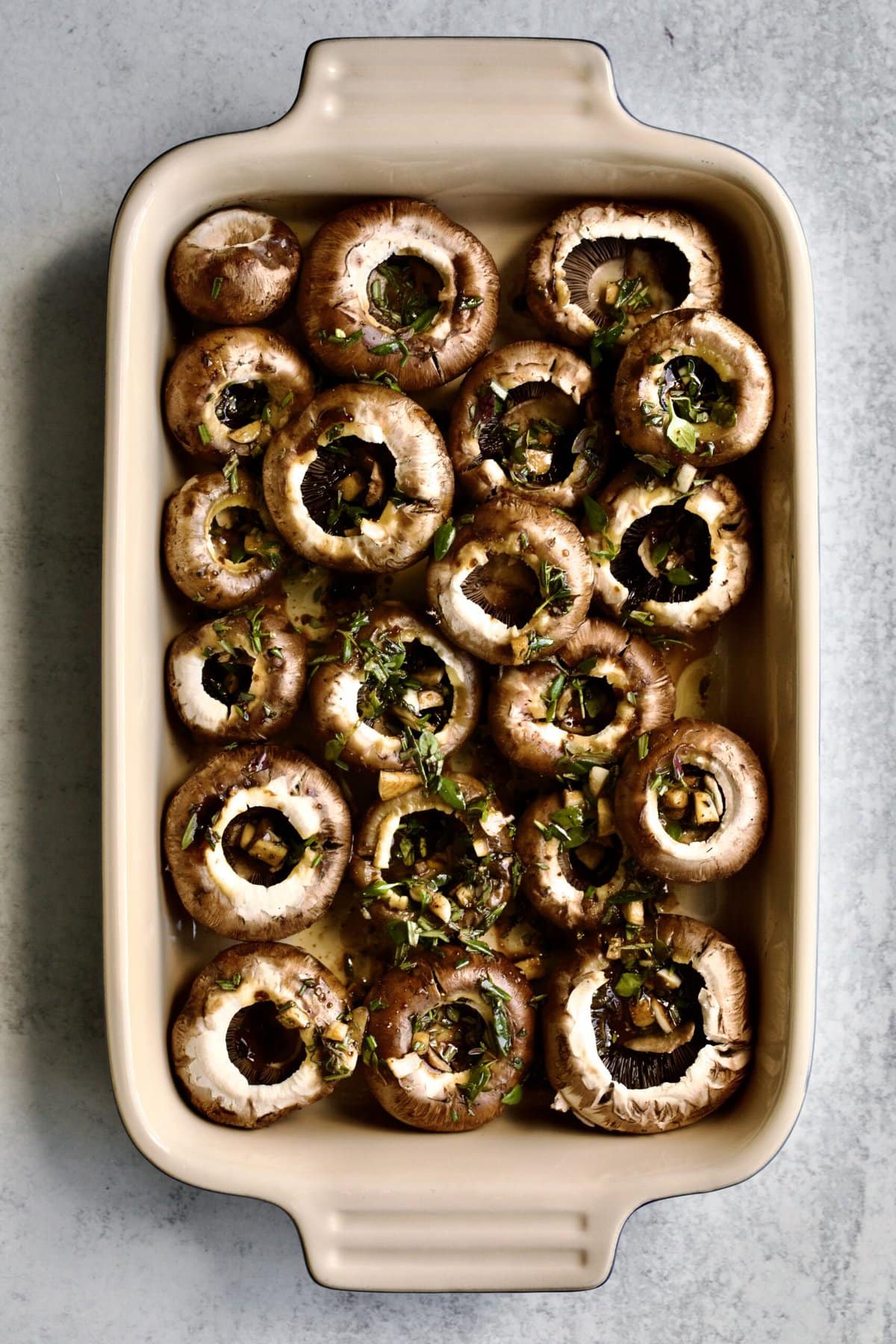 portabello mushrooms with balsamic marinade ready to roast in the oven