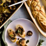roasted portabello mushrooms on plate with bread