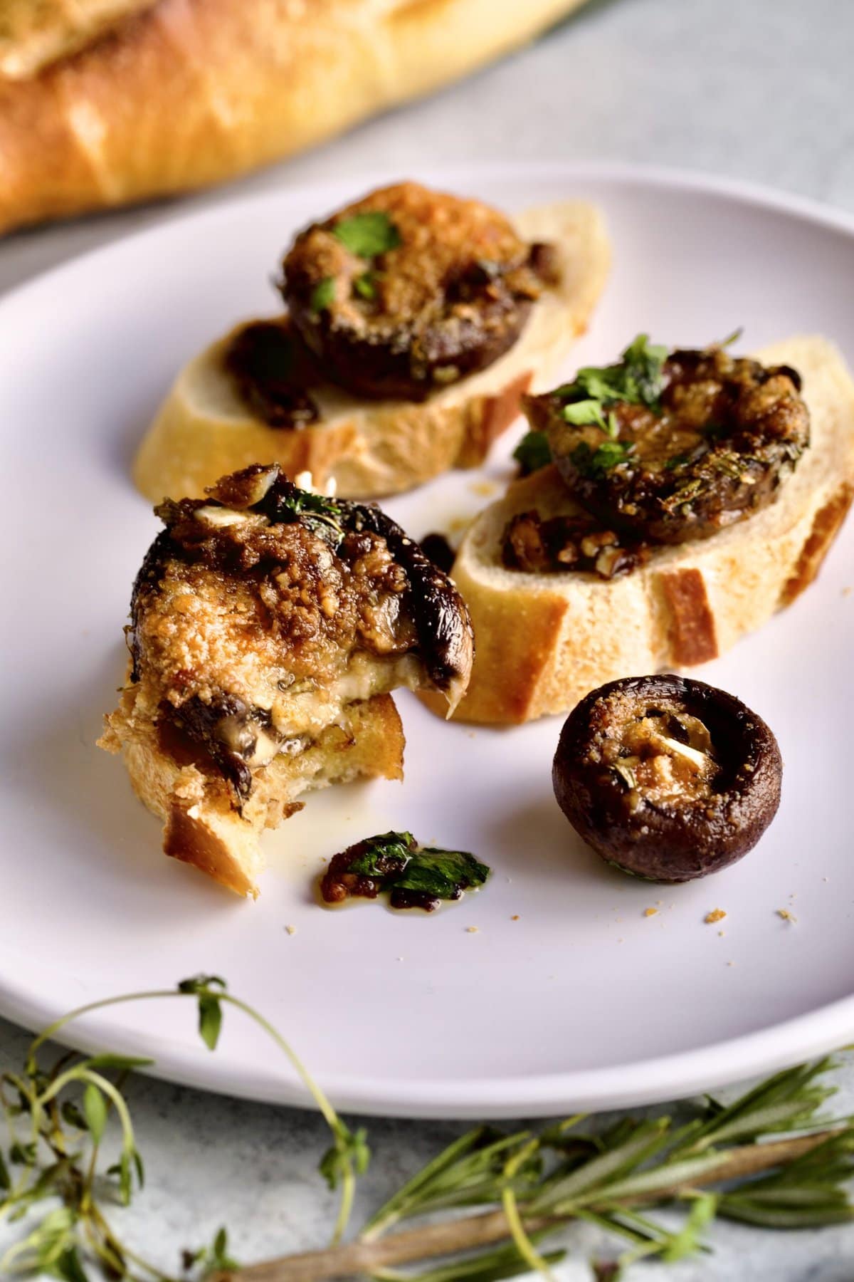 roasted portabello mushrooms on plate with bread