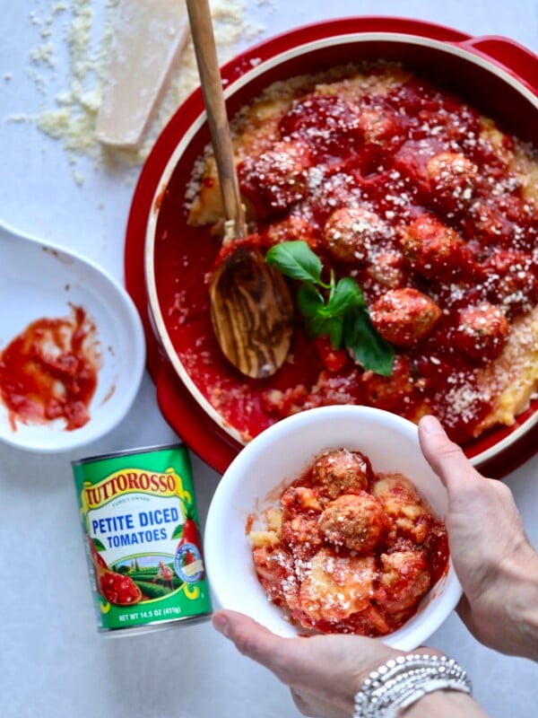 Creamy polenta with polpette al sugo with a can of Juttorosso petite diced tomatoes.