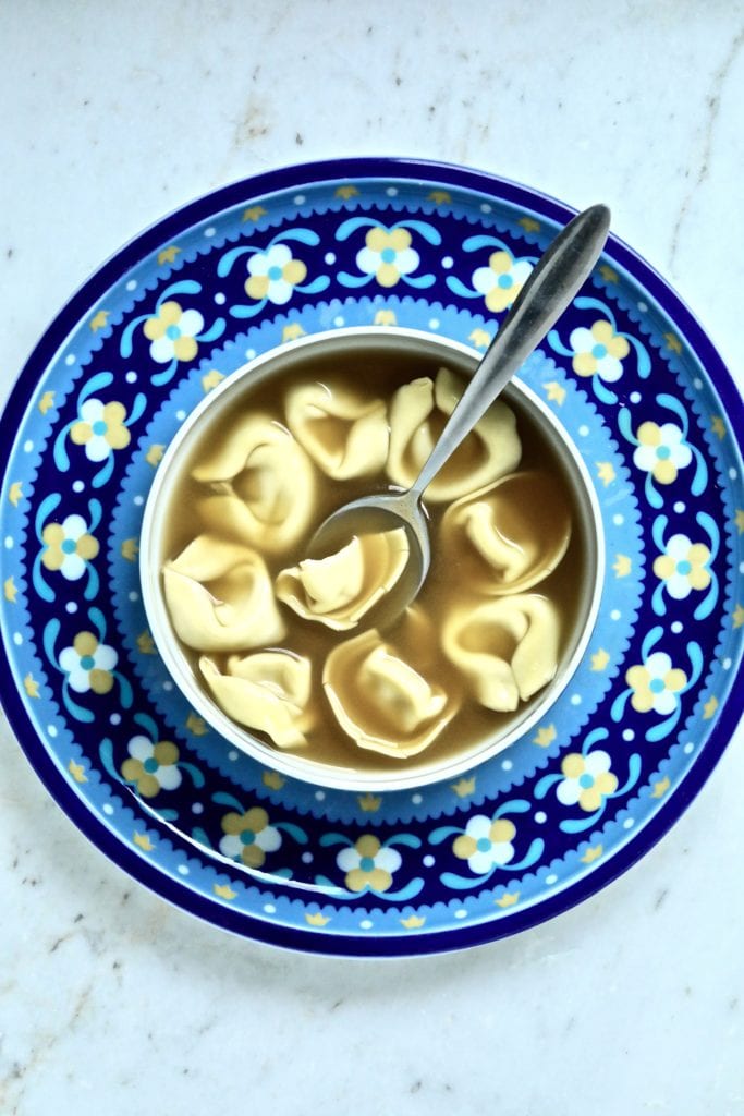 tortellini en brodo soup in a bowl