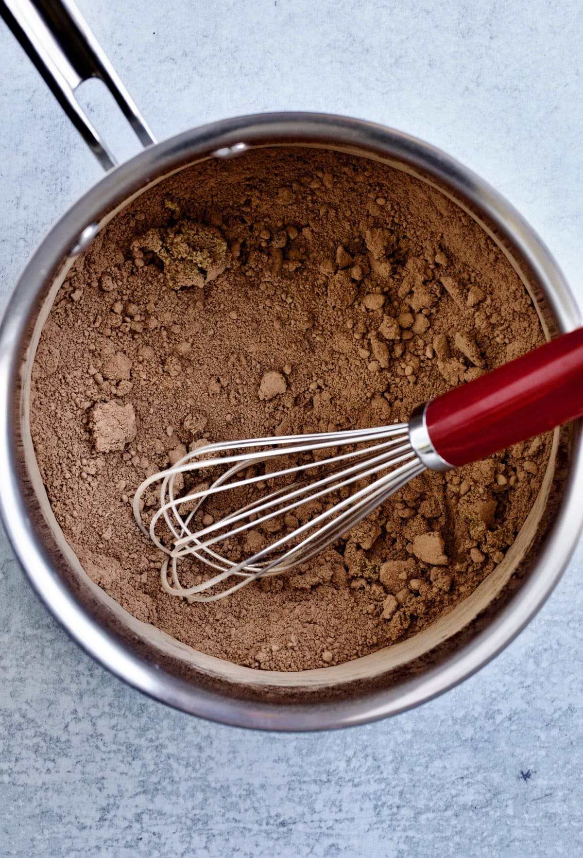 how to make- mixing ingredients in saucepan with whisk.