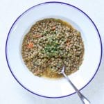 lentils on a plate with bread