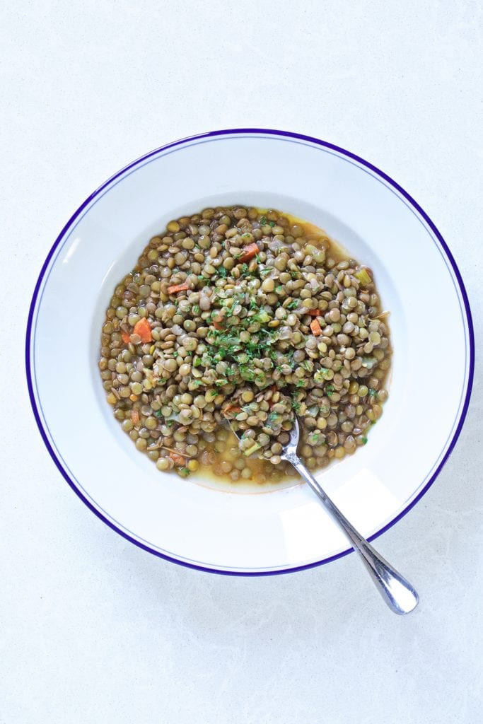 lentils on a plate with bread