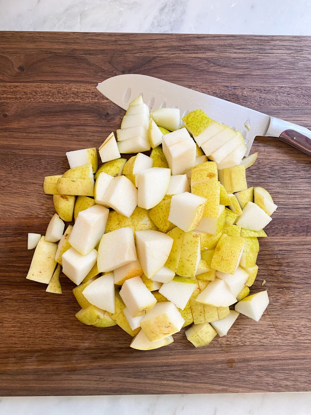 cutting the pears for the pear cake.