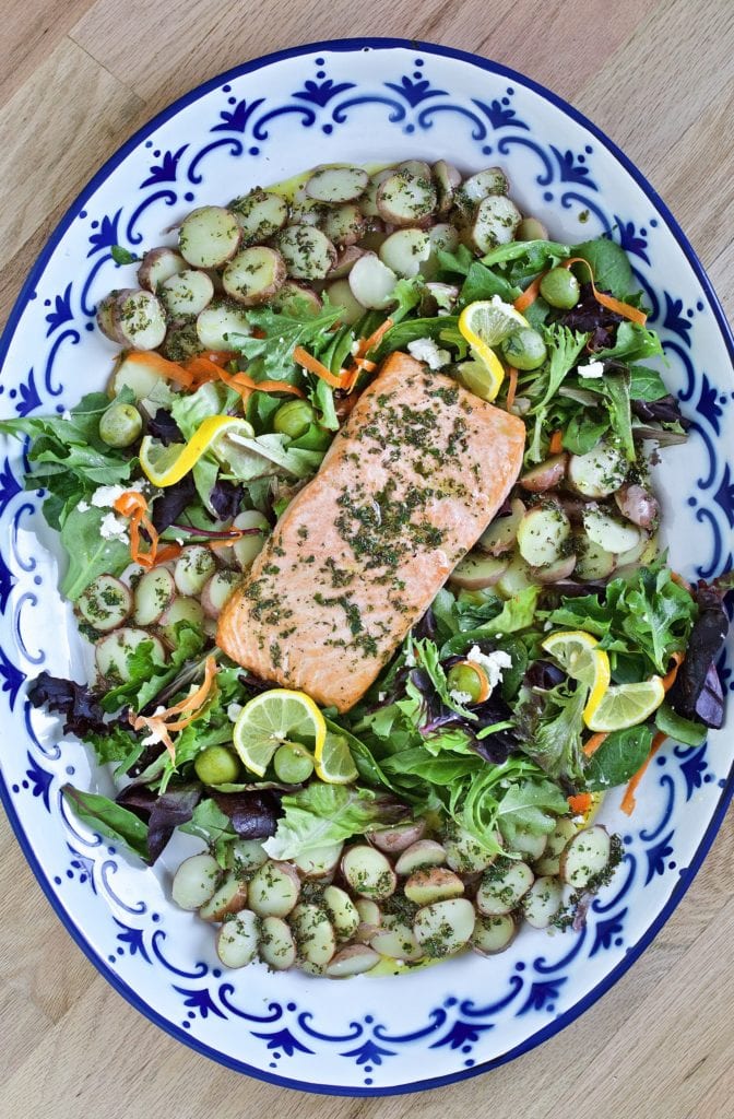 salmon salad with potatoes on a platter 