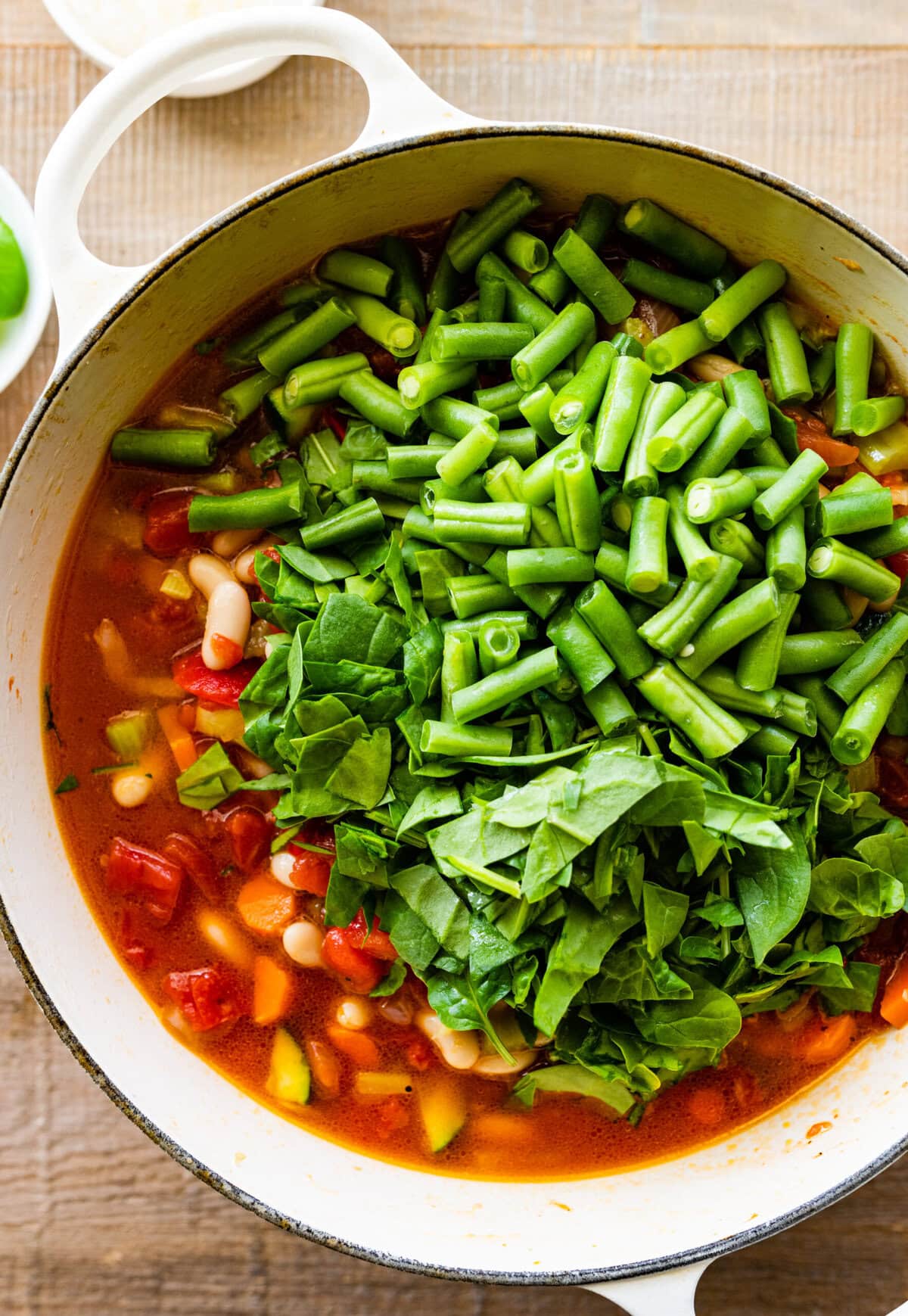 How to make Classic Minestrone Soup Recipe Instructions- add the green beans and spinach.