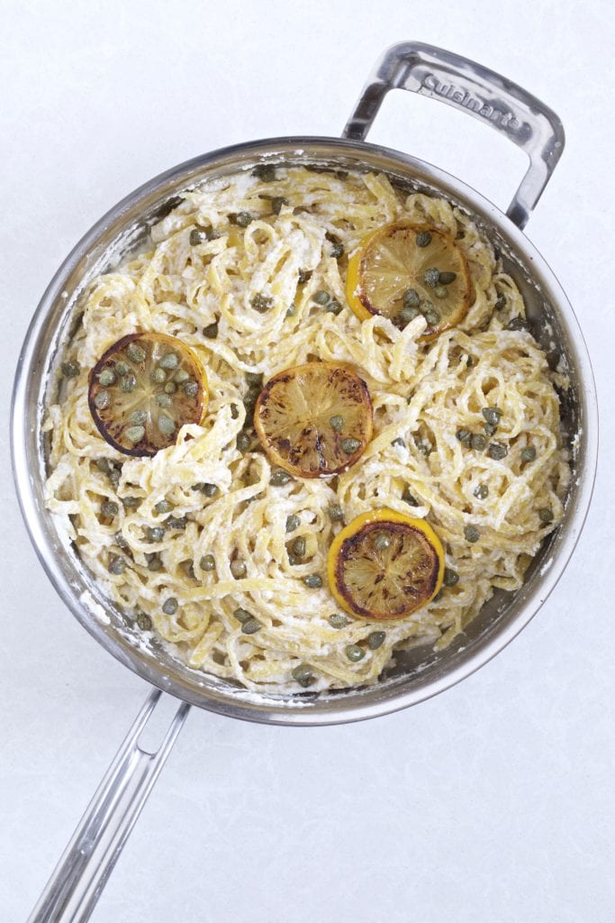 Lemon ricotta caper pasta in a pan.