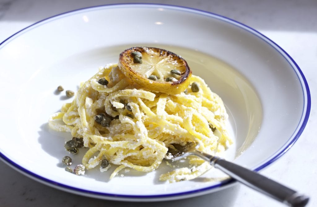 creamy pasta sauce in bowl lemon