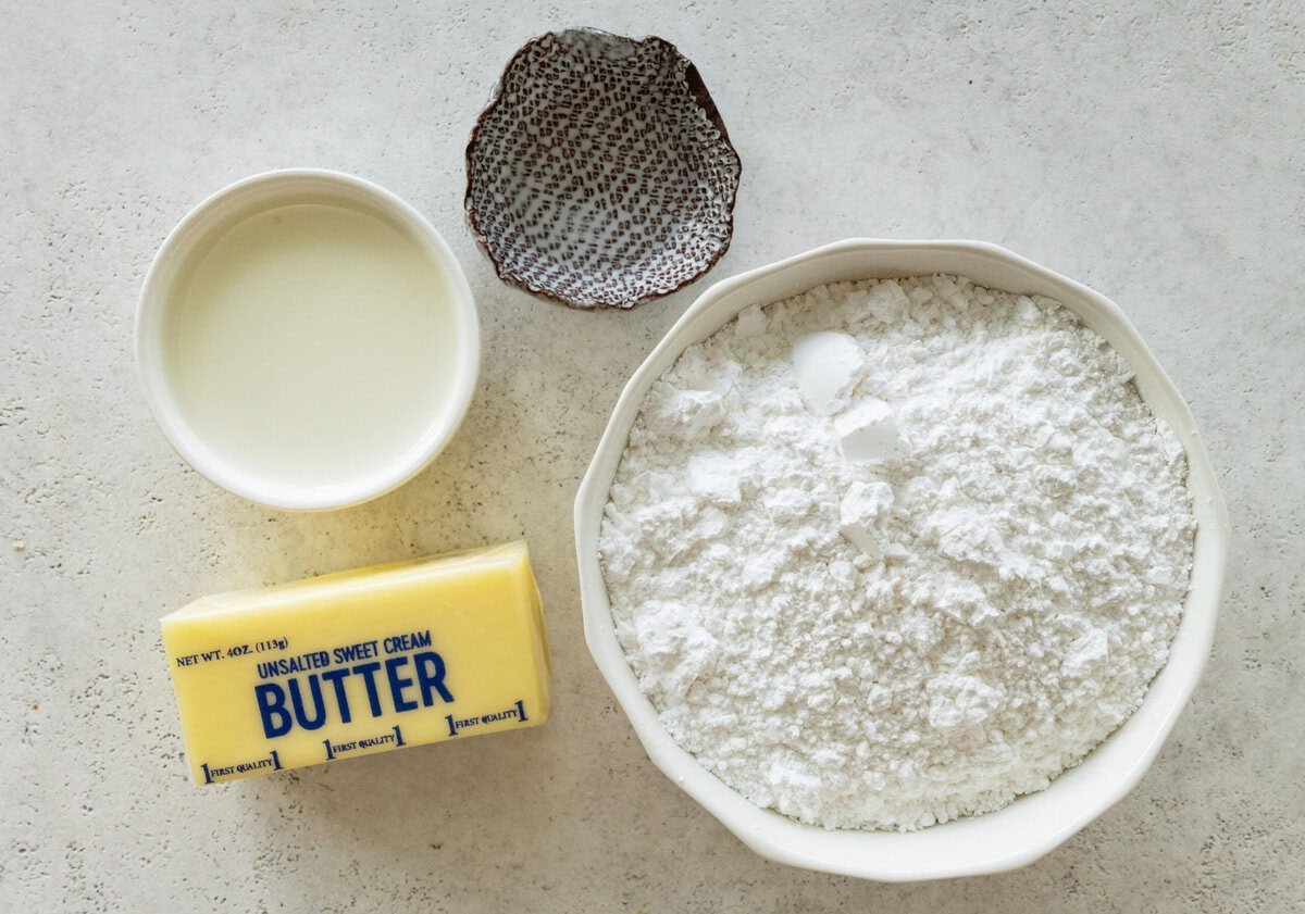 Ingredients to make a frosting for sugar cookies.