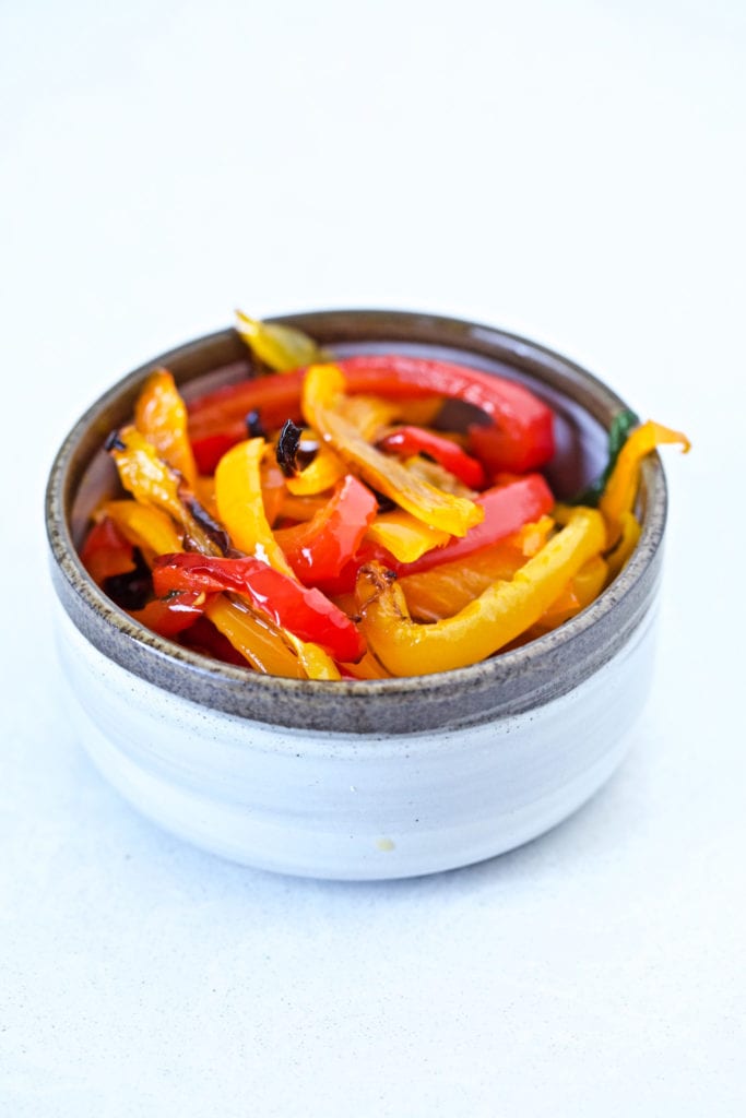 small ceramic bowl of roasted bell peppers