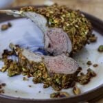 PISTACHIO ROASTED PACK OF LAMB ON A PLATE