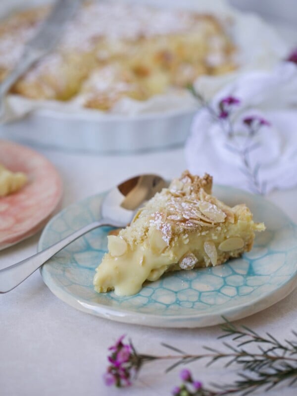 Italian Cake slice on a plate cream filling oozing out of slice