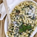 plate of creamy mushroom and spinach pasta shells on serving platter
