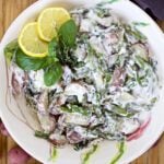 potato salad with lemon and asparagus in a bowl
