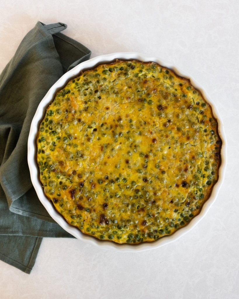 peas frittata served in a round dish