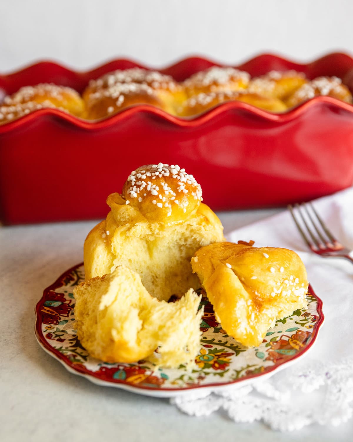 brioche buns on a red plate