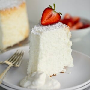 angel food cake on a plate with strawberries