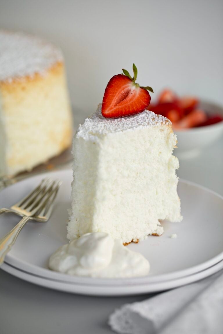 angel food cake on a plate with strawberries