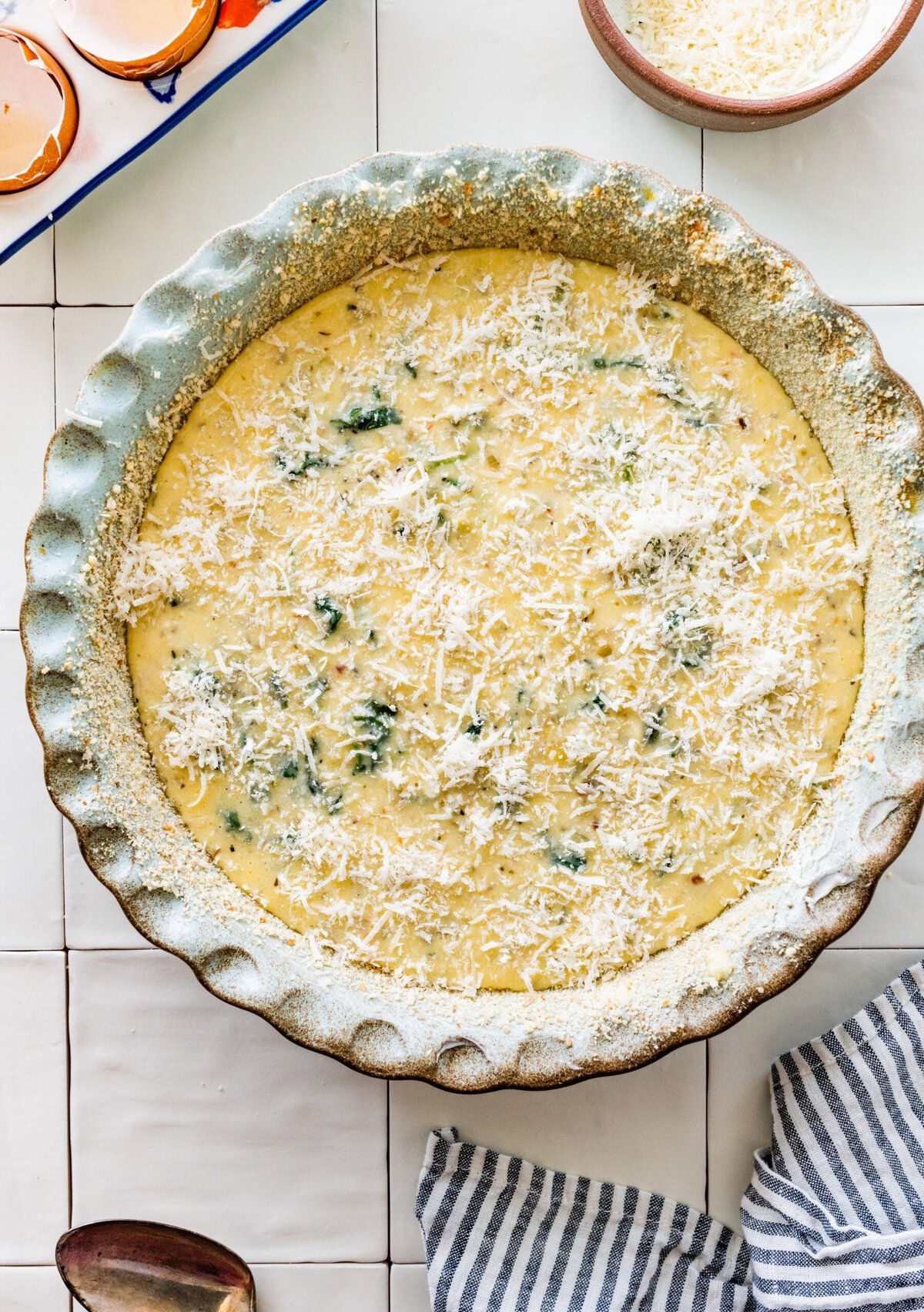 Frittata mixture poured into a pie dish.