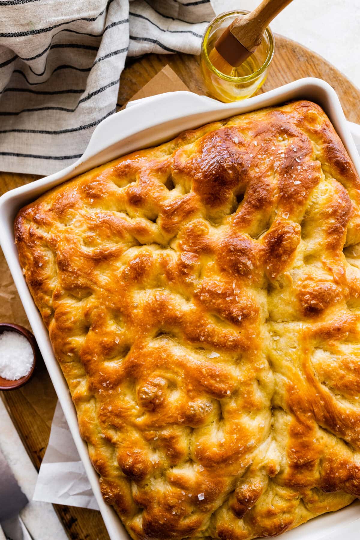 Focaccia when done baking. brush with a little olive oil and flake salt.