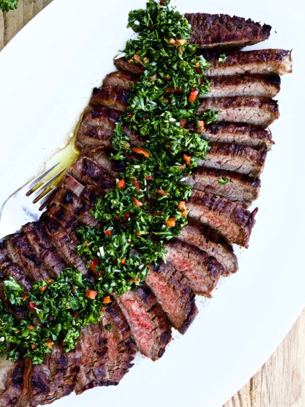 Tri-tip steak and chimichurri sauce on a plate