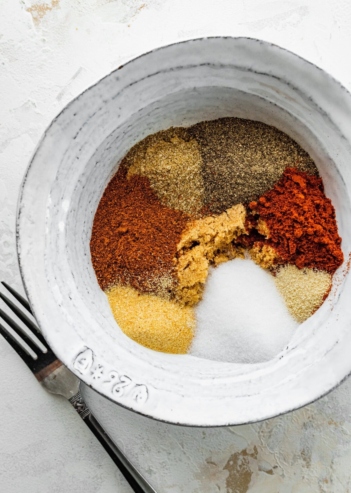 Add all the dry rub ingredients to a small bowl.