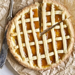 Whole crostata with a slice taken out