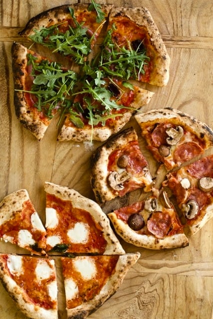 pizza napoletana (Neapolitan) on a wood board