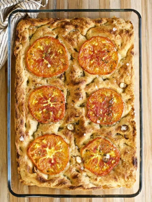 A serving of Italian focaccia with tomato and herb