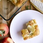 slice of focaccia with bite taken out