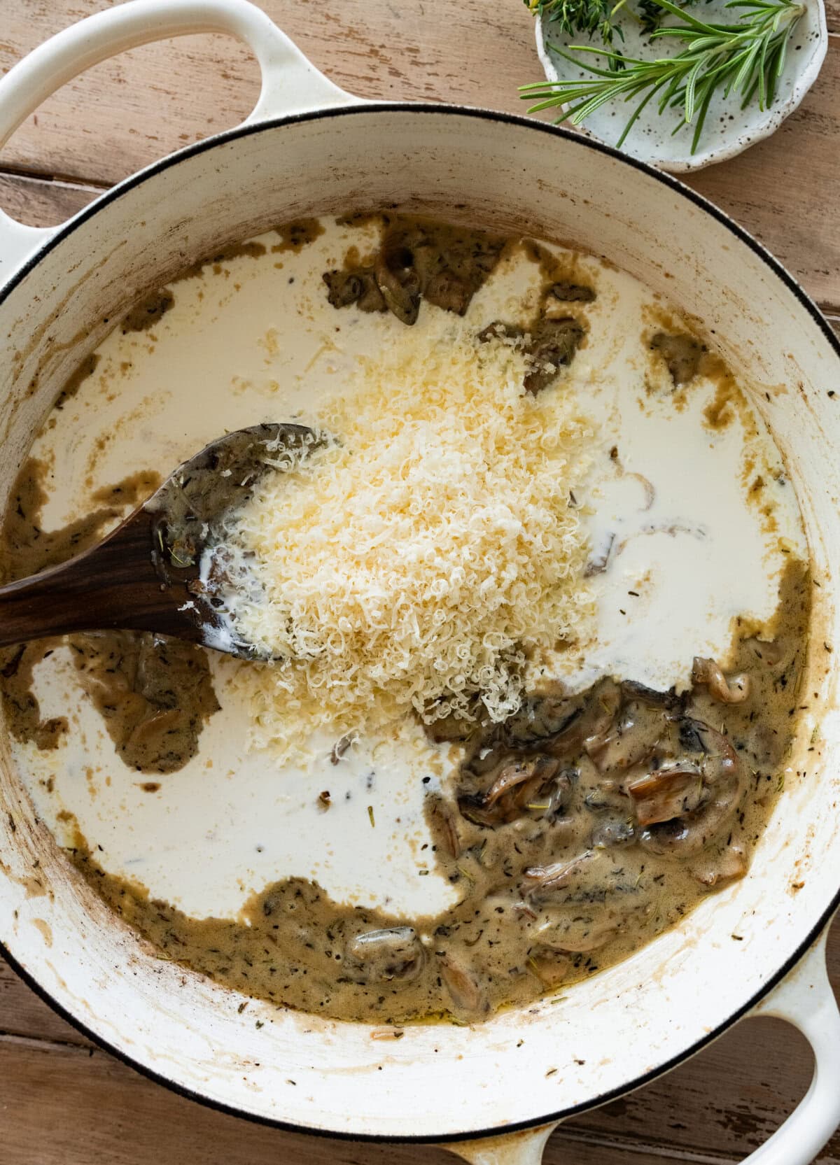 parmesan and heavy cream added to the pot.