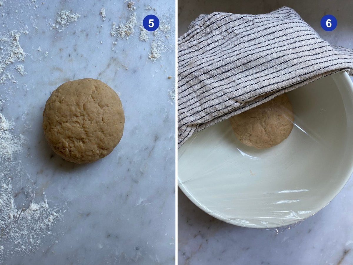 Cannoli shell dough rolled in a ball and then covered with plastic and a towel.