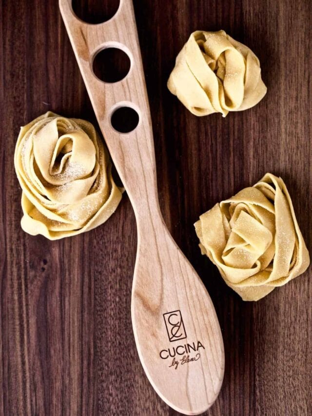 Wooden Pasta serving tool with pasta
