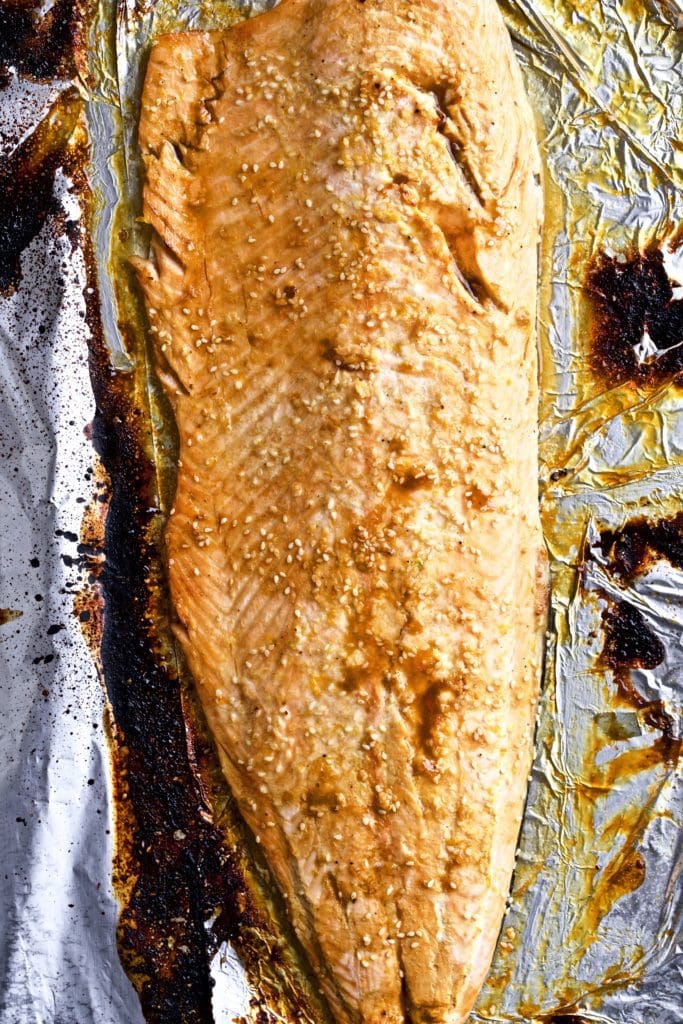 Baked Honey Orange Sesame Salmon on a pan