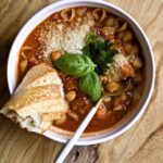 of pasta e ceci chickpea soup with bread on the side