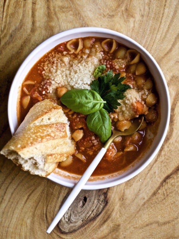 of pasta e ceci chickpea soup with bread on the side