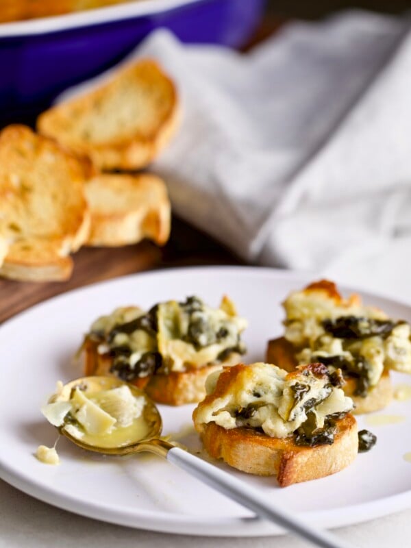 Hot mascarpone spinach and artichoke dip served on bread