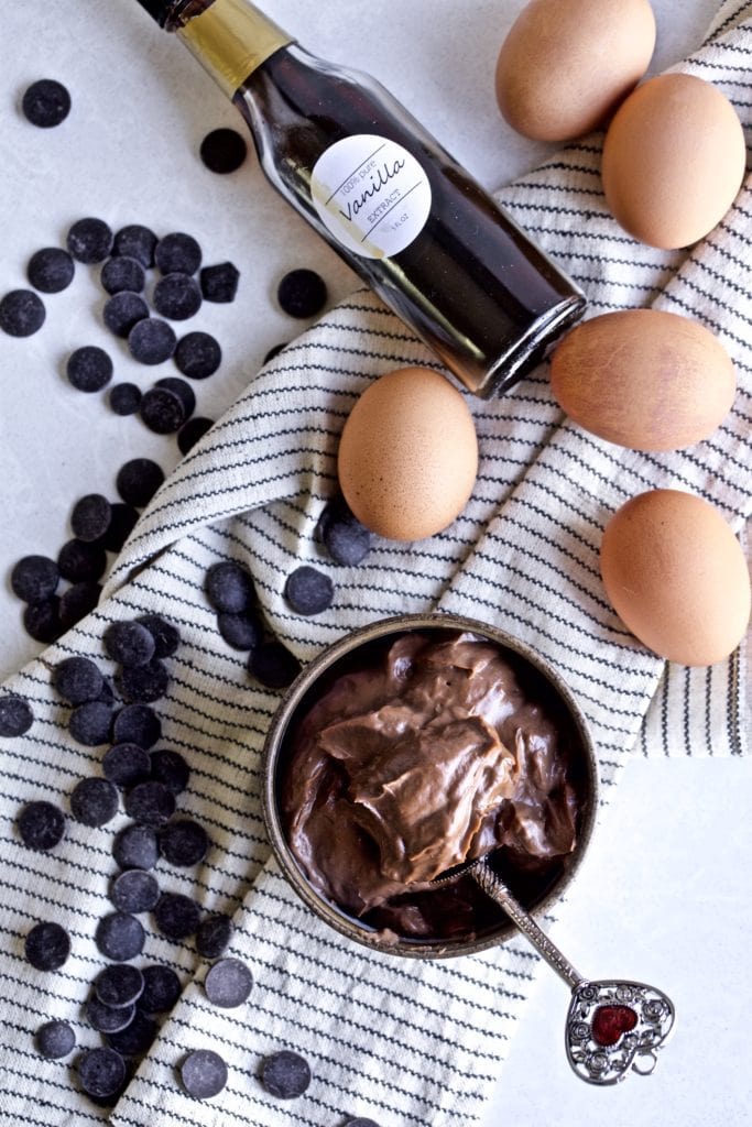 Italian chocolate pastry cream in a bowl with ingredients displayed